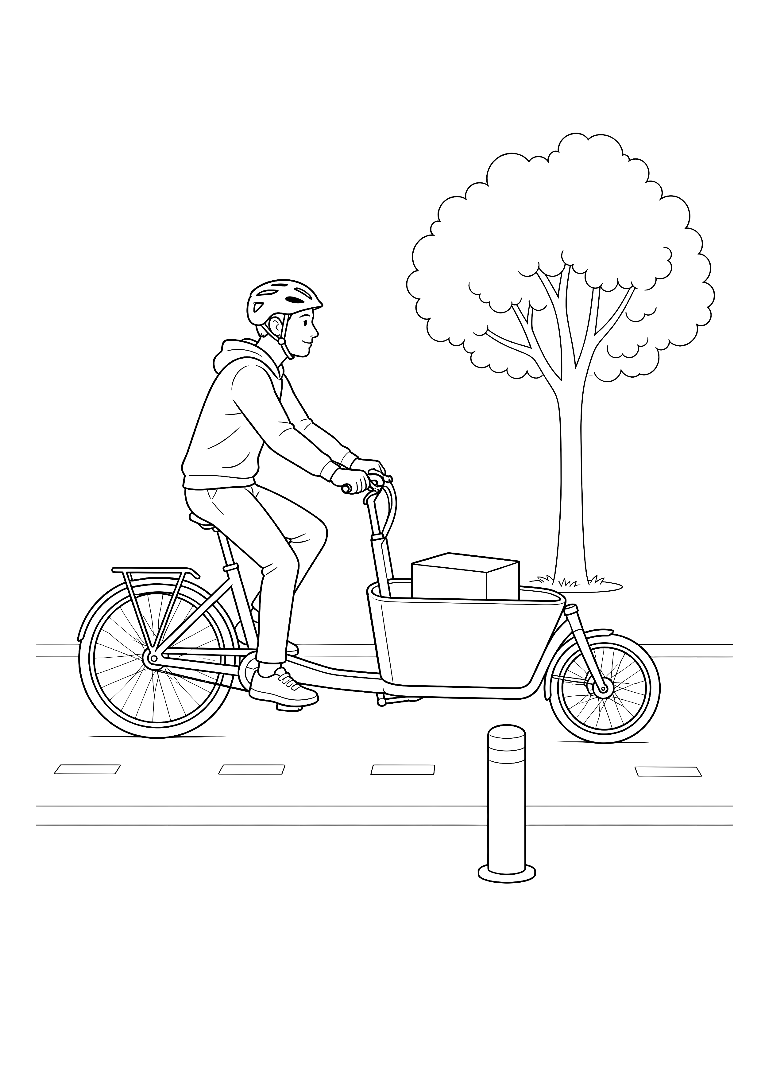 Fahrradkurier auf dem Radweg — Ein Fahrradkurier fährt mit einem Lastenrad auf einem geschützten städtischen Radweg.
